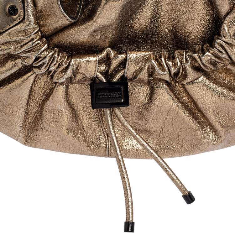 Pre Owned Burberry Gold Leather Warrior Drawstring Hobo