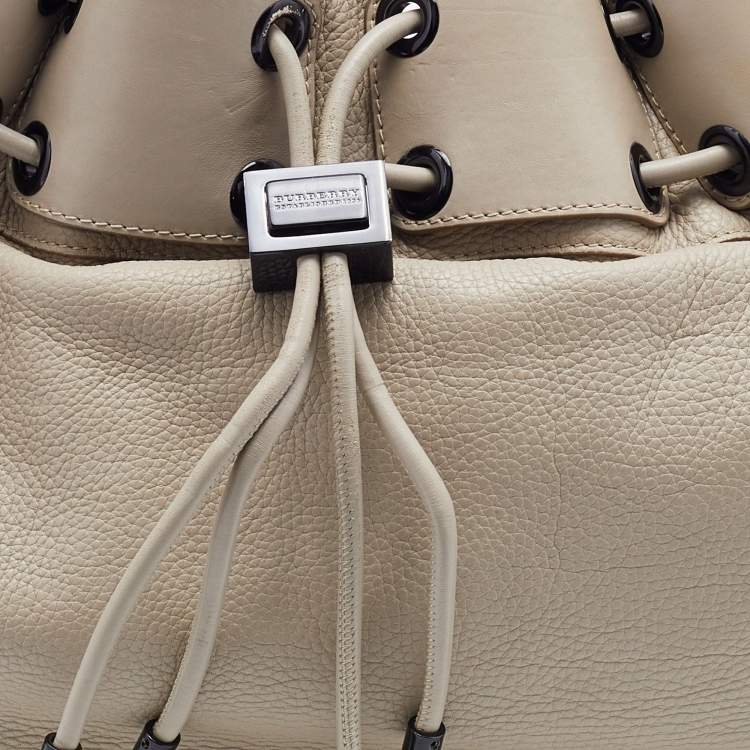 Pre Owned Burberry Light Beige Leather Drawstring Warrior Hobo