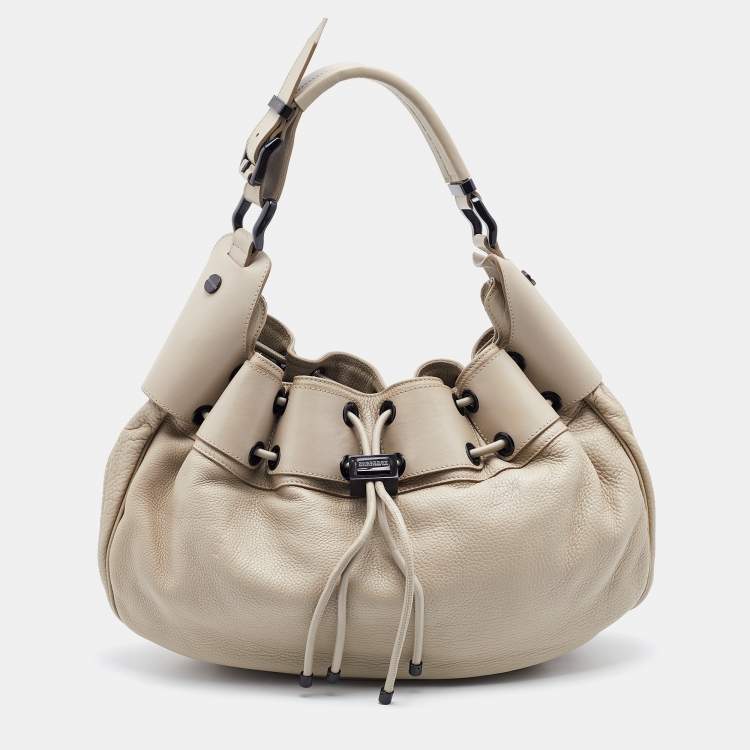 Pre Owned Burberry Light Beige Leather Drawstring Warrior Hobo