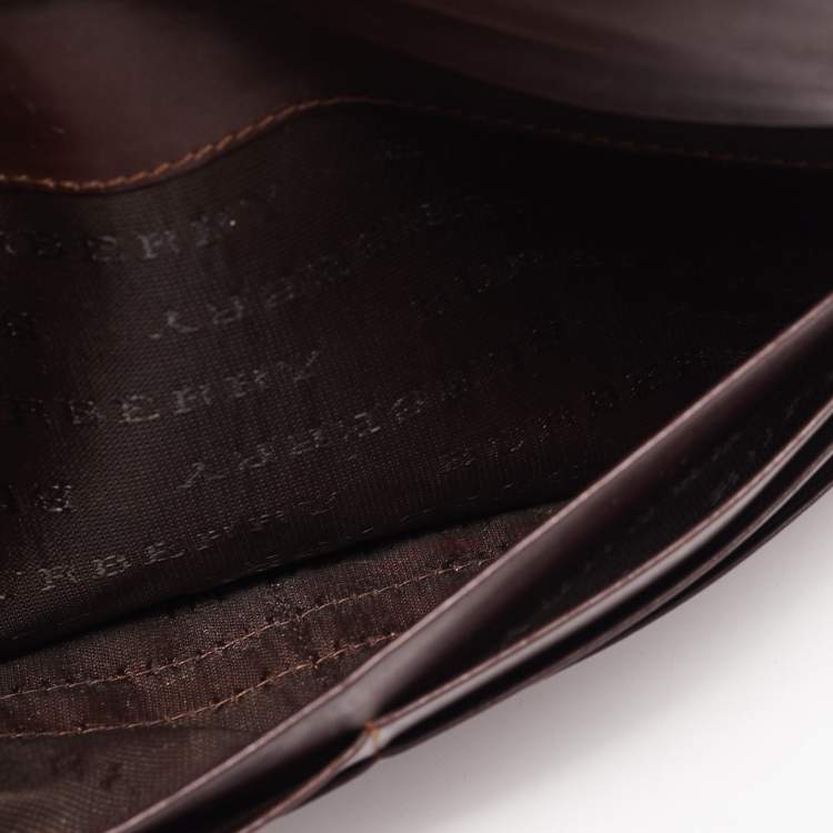 Pre Owned Burberry Brown/Beige Haymarket PVC and Leather Buckle Flap Continental Wallet