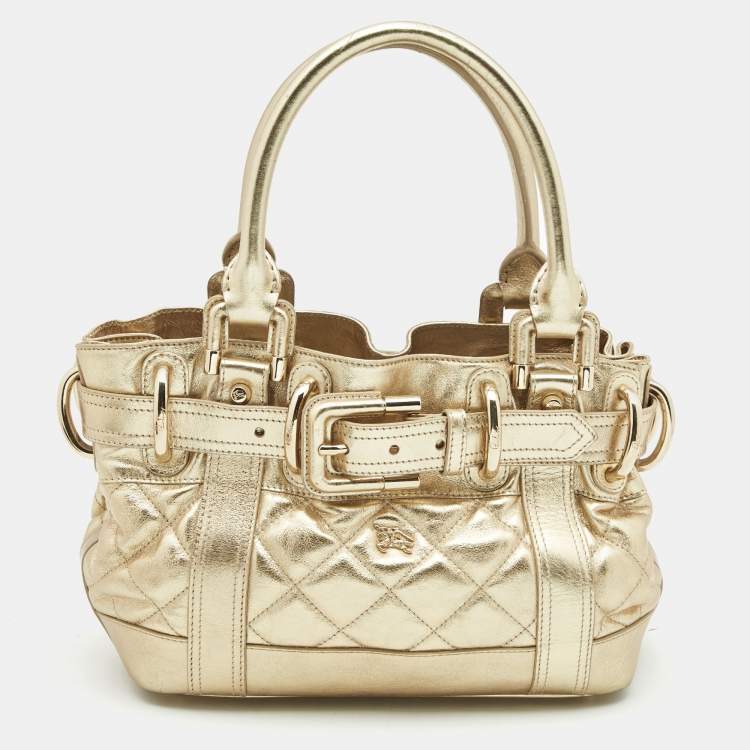 Burberry store gold handbag