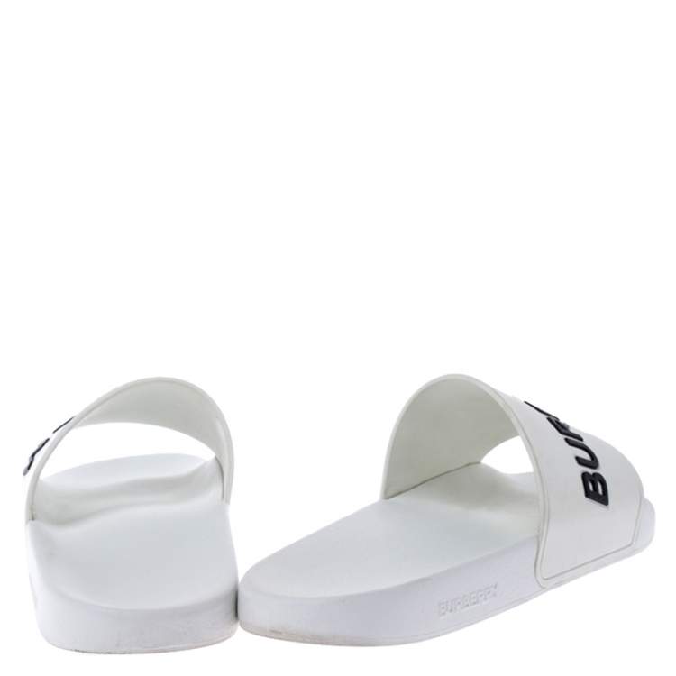 Pre Owned Burberry White Rubber And Black Kingdom Motif Slip On Slides Size 43