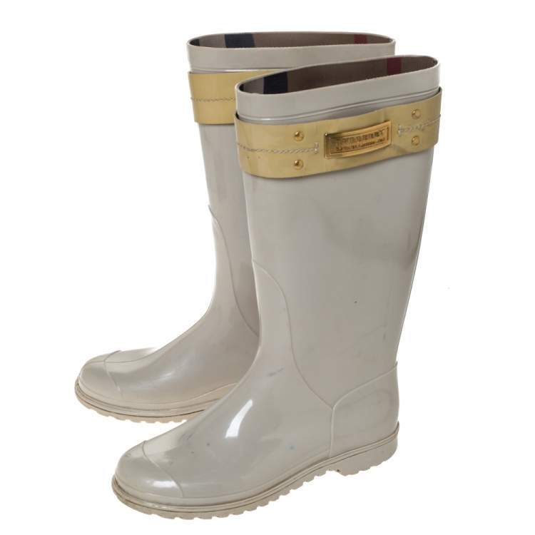 beige rain boots