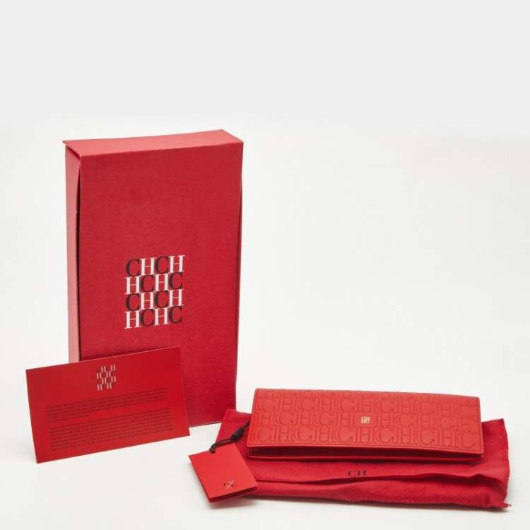 Pre Owned Carolina Herrera Red Monogram Embossed Leather Bifold Long Wallet