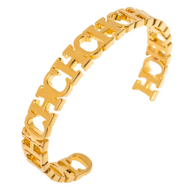 Pre Owned Carolina Herrera Gold Tone Between the Line Open Cuff Bracelet