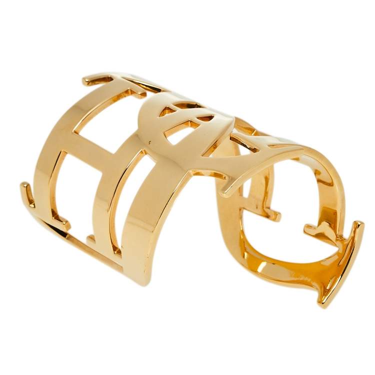 Pre Owned Carolina Herrera Gold Tone Logo Cuff Bracelet