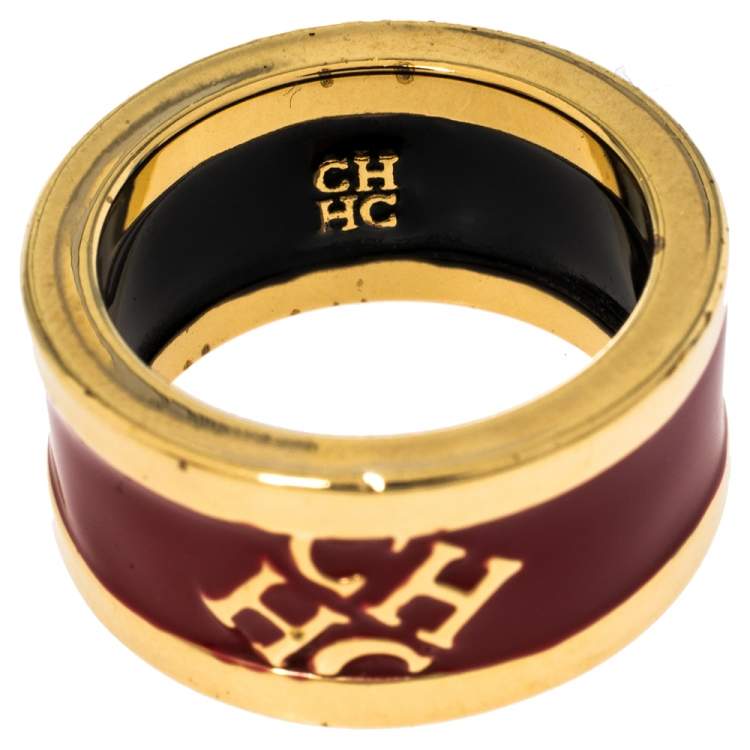 Pre Owned Carolina Herrera Red Enamel Logo Gold Tone Band Ring Size 56