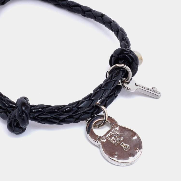 Pre Owned Carolina Herrera CH Silver Tone Lock & Key Braided Black Leather Bracelet