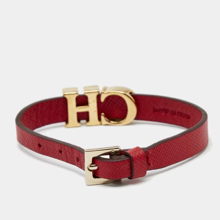 Pre Owned Carolina Herrera Crystal Logo Charm Red Leather Gold Tone Bracelet