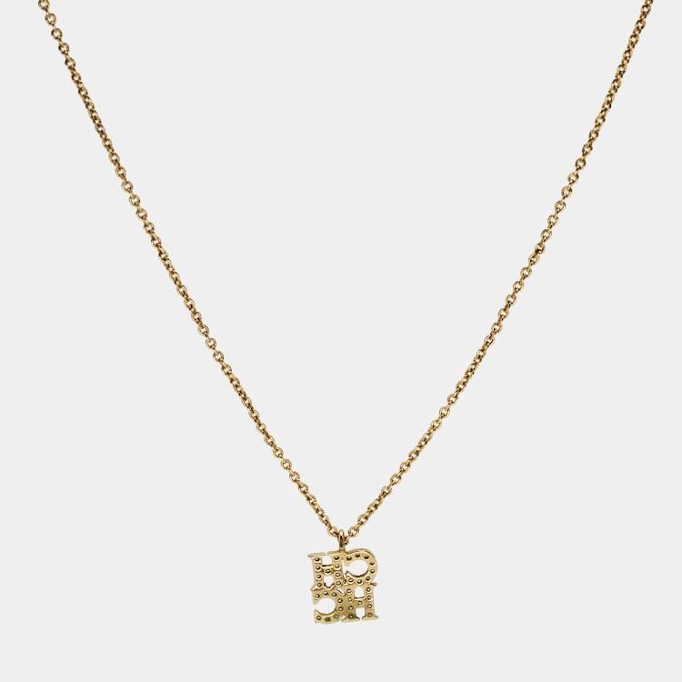 Pre Owned CH Carolina Herrera Crystal Logo Pendant Gold Tone Necklace
