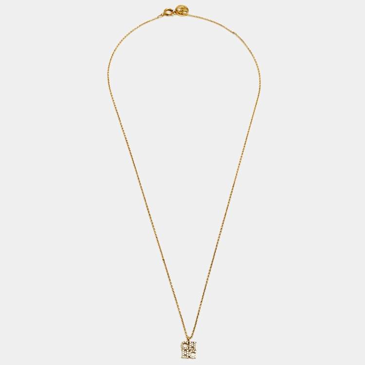 Pre Owned CH Carolina Herrera Crystal Logo Pendant Gold Tone Necklace