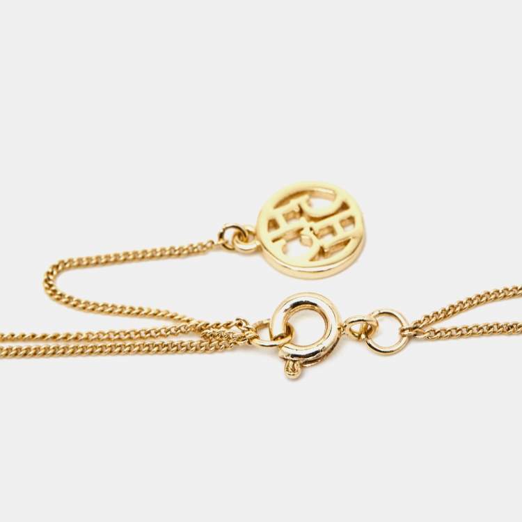 Pre Owned Carolina Herrera Faux Pearl Gold Tone Logo Double Strand Necklace