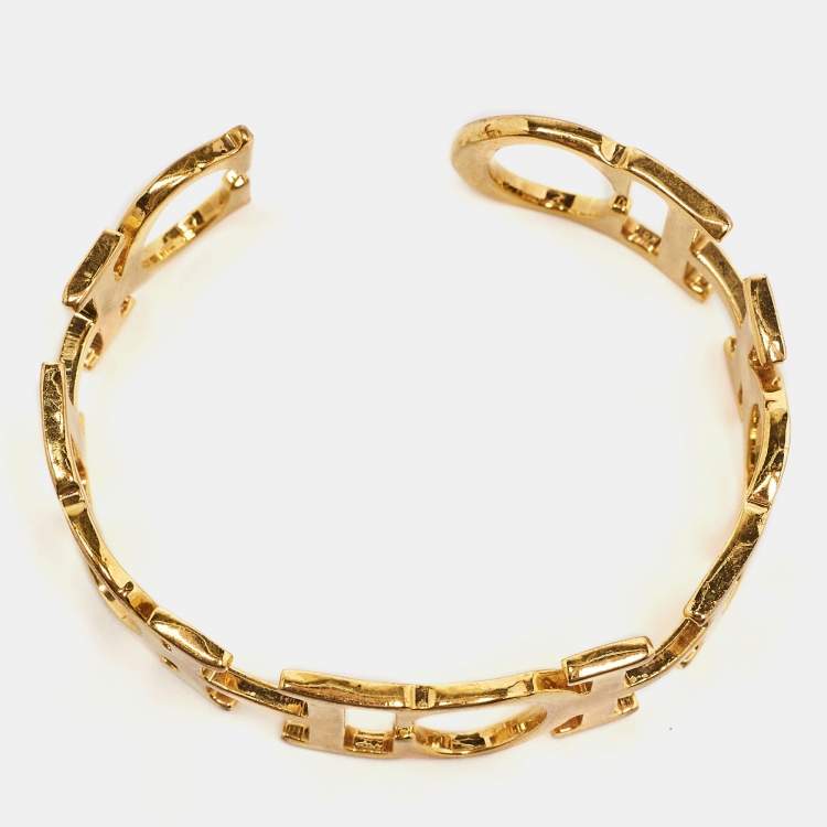 Pre Owned Carolina Herrera CH Between the Line Gold Tone Cuff Bracelet