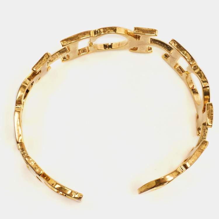 Pre Owned Carolina Herrera CH Between the Line Gold Tone Cuff Bracelet