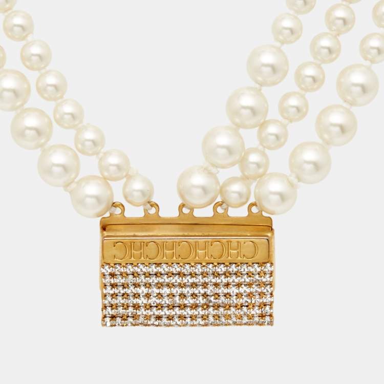 Pre Owned Carolina Herrera CH Crystal Faux Pearl Gold Tone Bracelet