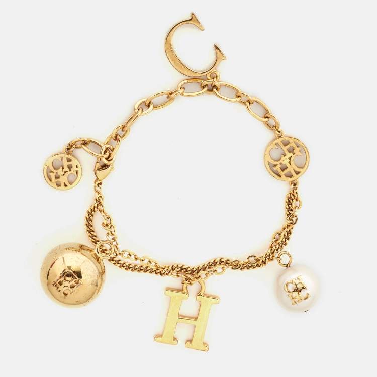 Pre Owned Carolina Herrera CH Faux Pearl Gold Tone Charm Bracelet