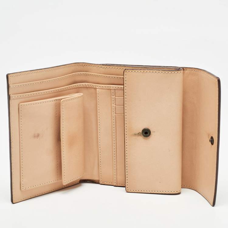 Pre Owned Carolina Herrera Brown Monogram Embossed Leather Trifold Wallet