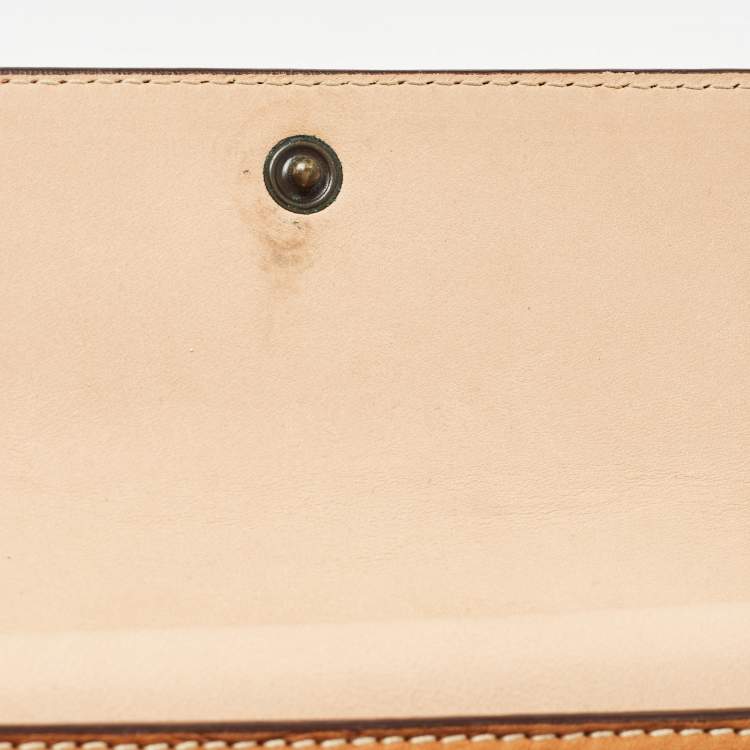 Pre Owned Carolina Herrera Brown Monogram Embossed Leather Trifold Wallet