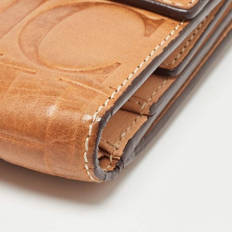 Pre Owned Carolina Herrera Brown Monogram Embossed Leather Trifold Wallet