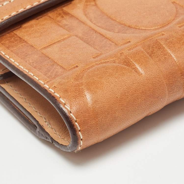 Pre Owned Carolina Herrera Brown Monogram Embossed Leather Trifold Wallet