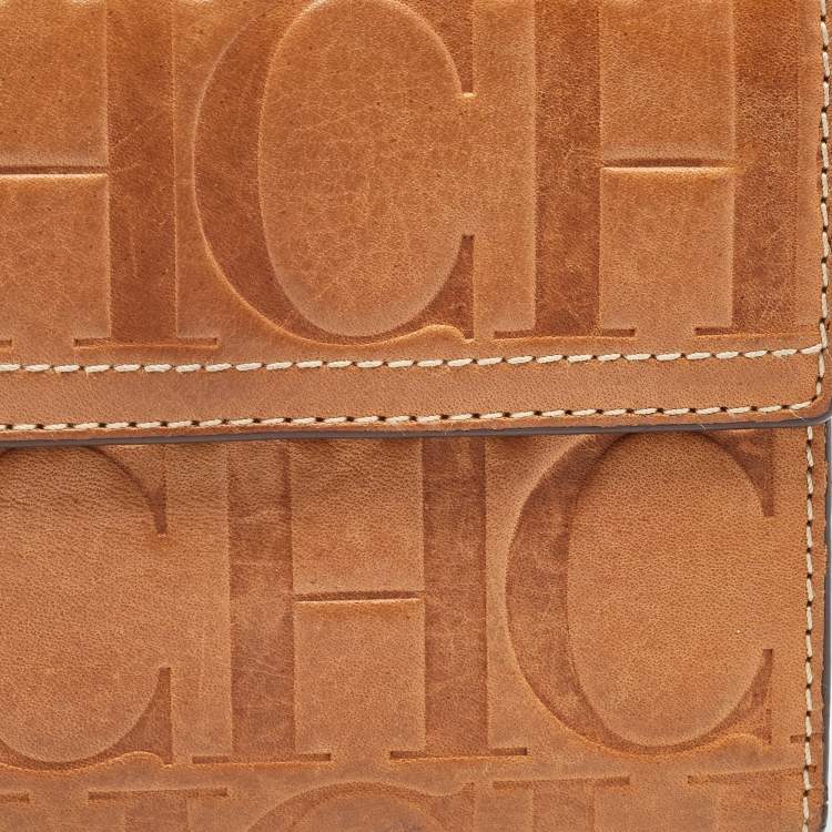 Pre Owned Carolina Herrera Brown Monogram Embossed Leather Trifold Wallet