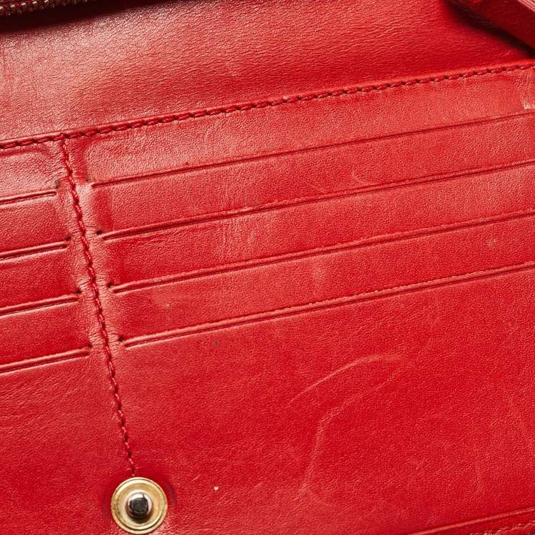 Pre Owned Carolina Herrera Red Monogram Embossed Leather Bifold Long Wallet