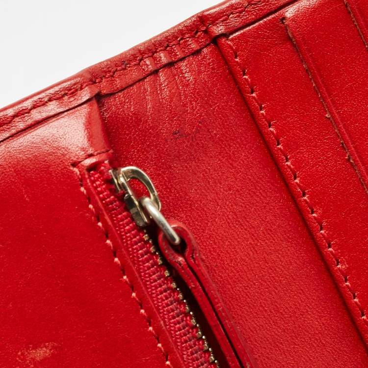 Pre Owned Carolina Herrera Red Monogram Embossed Leather Bifold Long Wallet