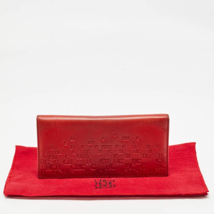 Pre Owned Carolina Herrera Red Monogram Embossed Leather Bifold Long Wallet