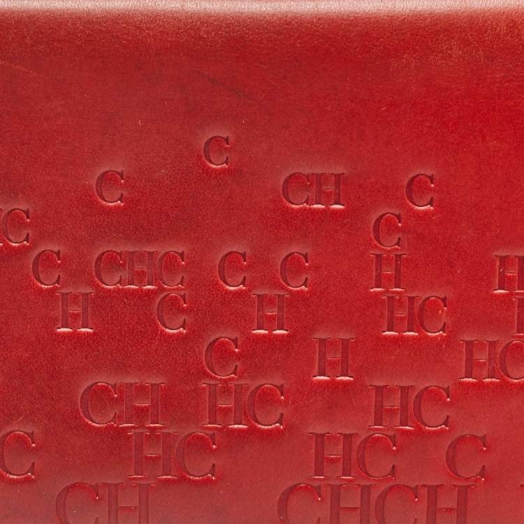 Pre Owned Carolina Herrera Red Monogram Embossed Leather Bifold Long Wallet