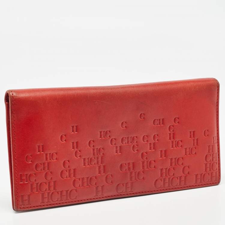 Pre Owned Carolina Herrera Red Monogram Embossed Leather Bifold Long Wallet