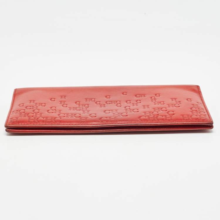 Pre Owned Carolina Herrera Red Monogram Embossed Leather Bifold Long Wallet