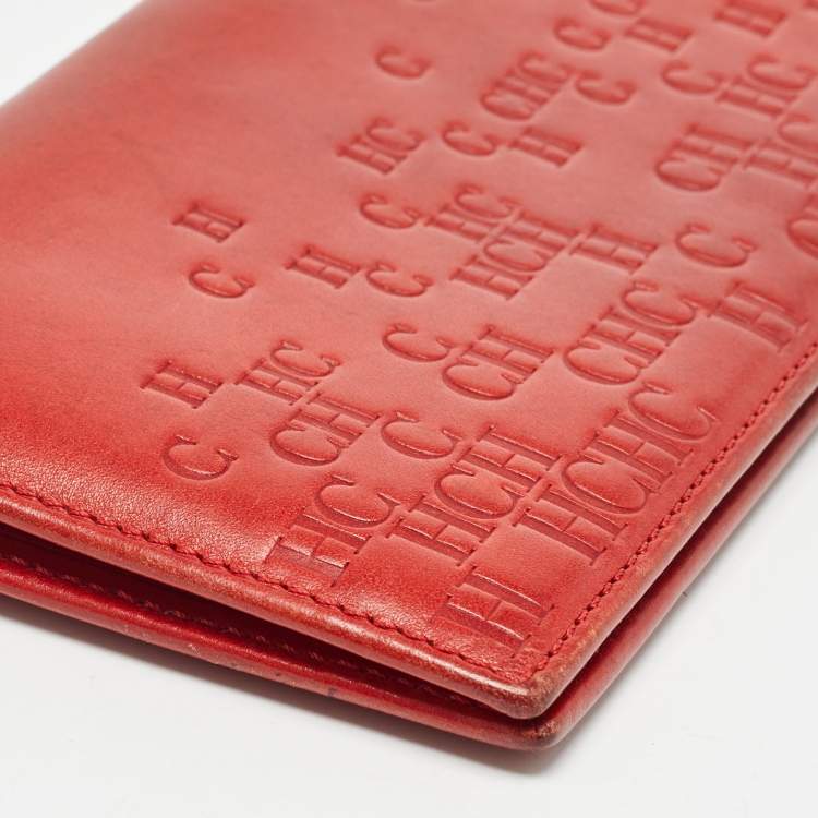 Pre Owned Carolina Herrera Red Monogram Embossed Leather Bifold Long Wallet