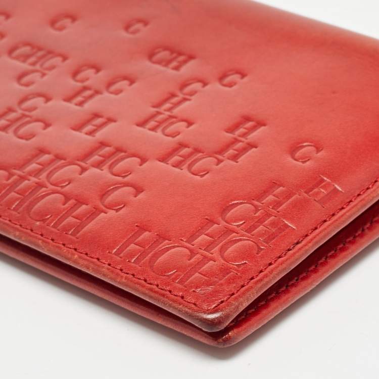 Pre Owned Carolina Herrera Red Monogram Embossed Leather Bifold Long Wallet
