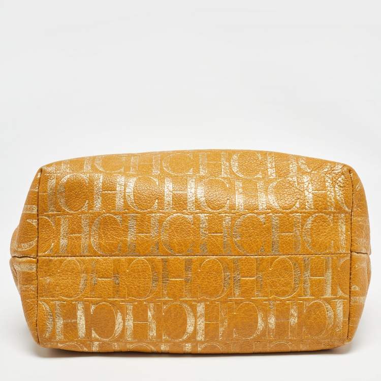 Pre Owned Carolina Herrera Gold/Mustard Monogram Embossed Leather Ring Handle Hobo