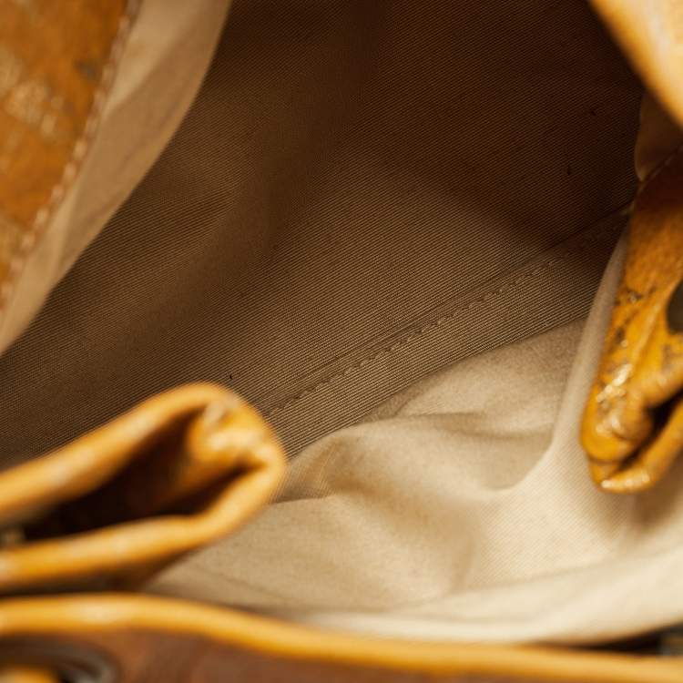 Pre Owned Carolina Herrera Gold/Mustard Monogram Embossed Leather Ring Handle Hobo
