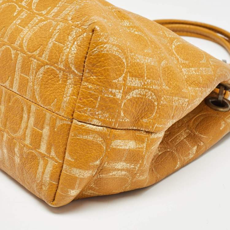 Pre Owned Carolina Herrera Gold/Mustard Monogram Embossed Leather Ring Handle Hobo