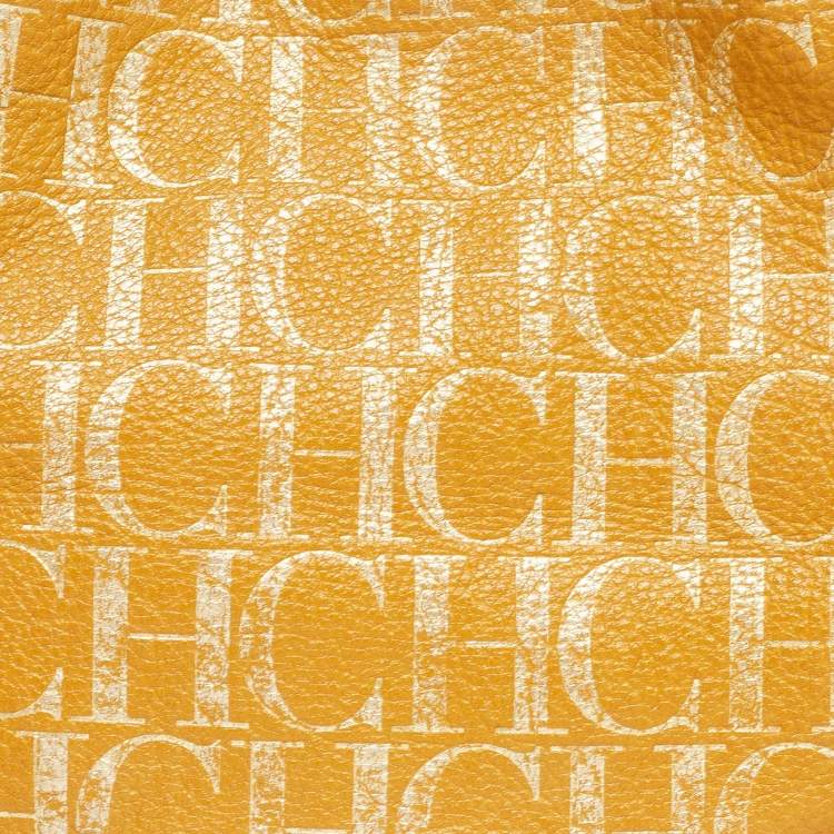 Pre Owned Carolina Herrera Gold/Mustard Monogram Embossed Leather Ring Handle Hobo