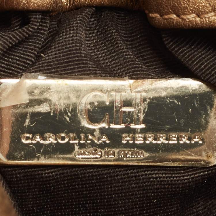 Pre Owned Carolina Herrera Gold Monogram Embossed Leather Bow Bucket Bag