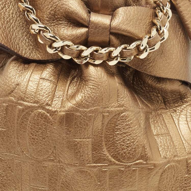 Pre Owned Carolina Herrera Gold Monogram Embossed Leather Bow Bucket Bag