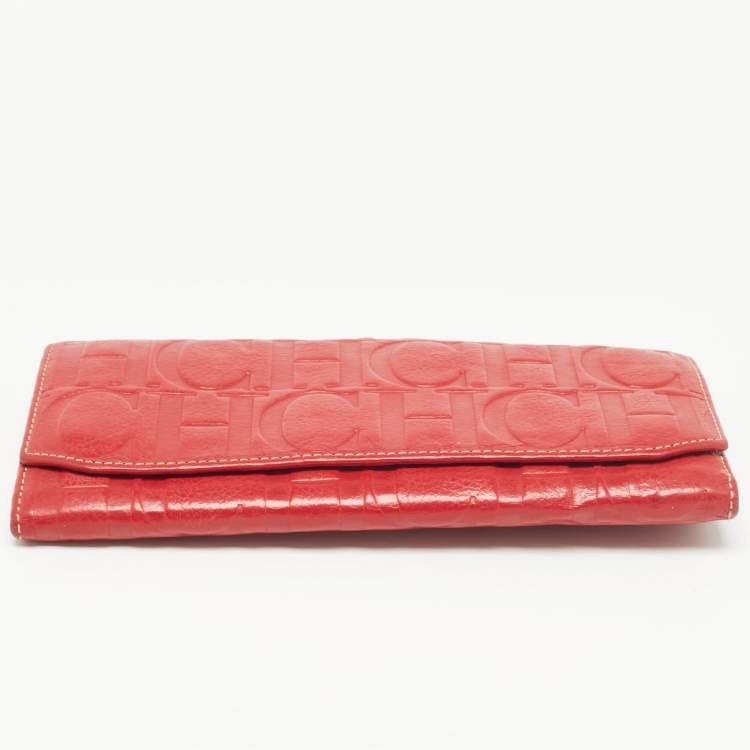 Pre Owned Carolina Herrera Red Monogram Embossed Leather Flap Continental Wallet
