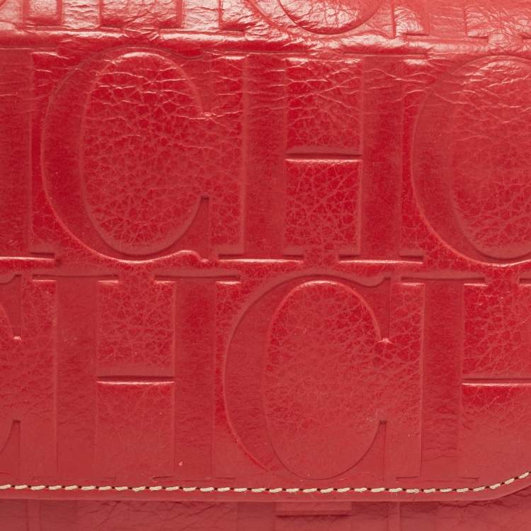 Pre Owned Carolina Herrera Red Monogram Embossed Leather Flap Continental Wallet