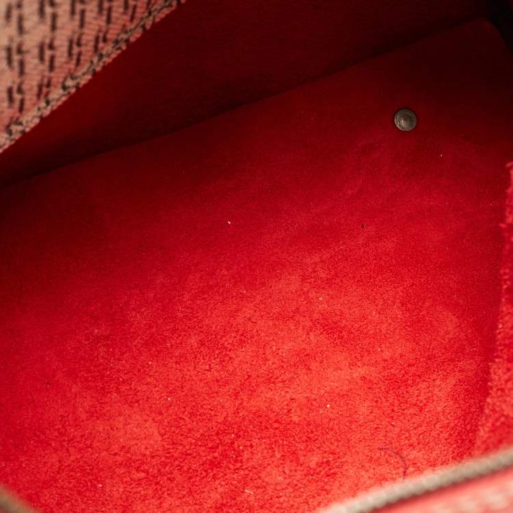 Pre Owned Carolina Herrera Red Monogram Embossed Leather Large Andy Boston Bag