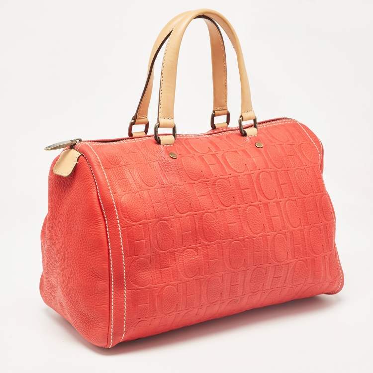 Pre Owned Carolina Herrera Red Monogram Embossed Leather Large Andy Boston Bag