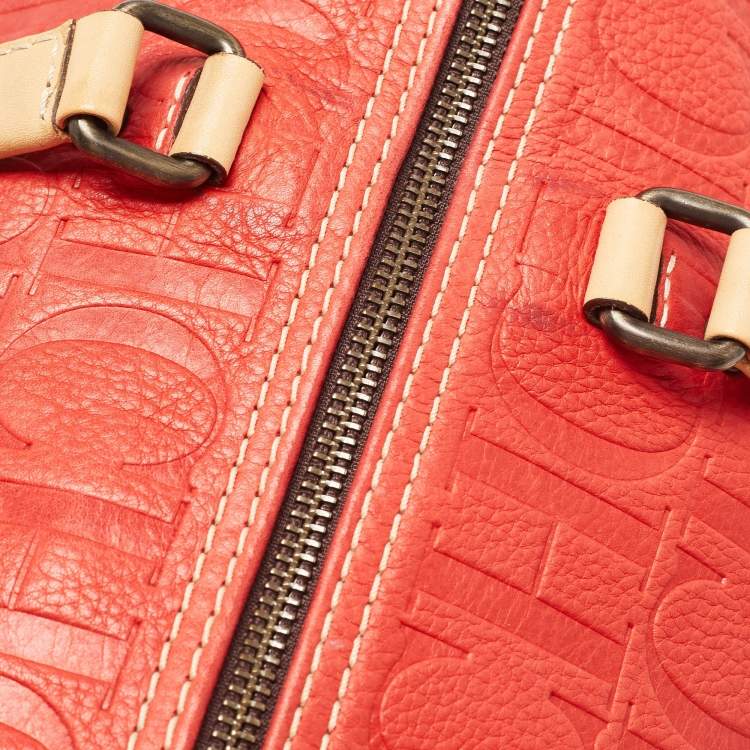 Pre Owned Carolina Herrera Red Monogram Embossed Leather Large Andy Boston Bag