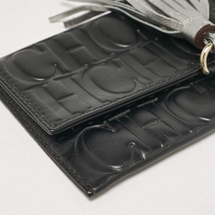 Pre Owned Carolina Herrera Black Monogram Embossed Leather Tassel Clutch