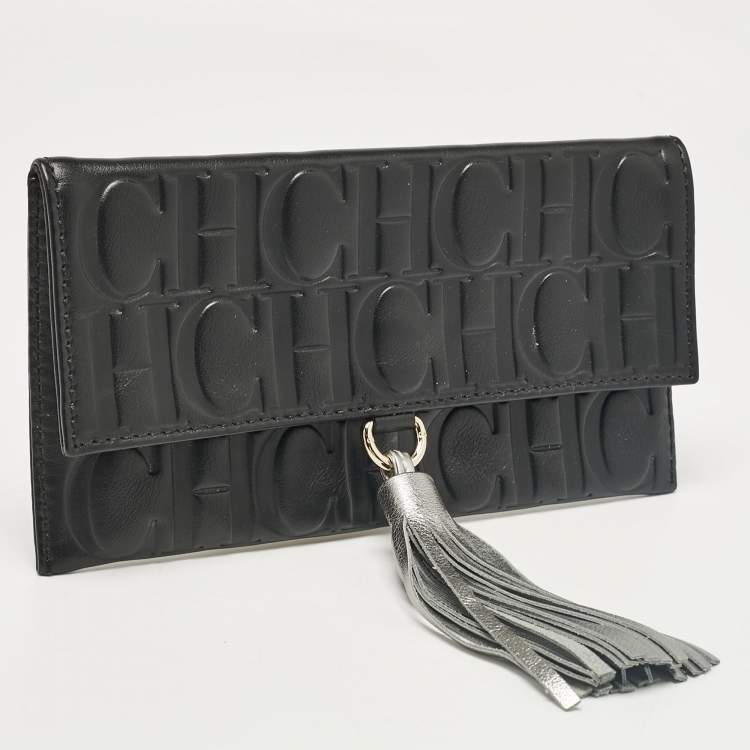 Pre Owned Carolina Herrera Black Monogram Embossed Leather Tassel Clutch
