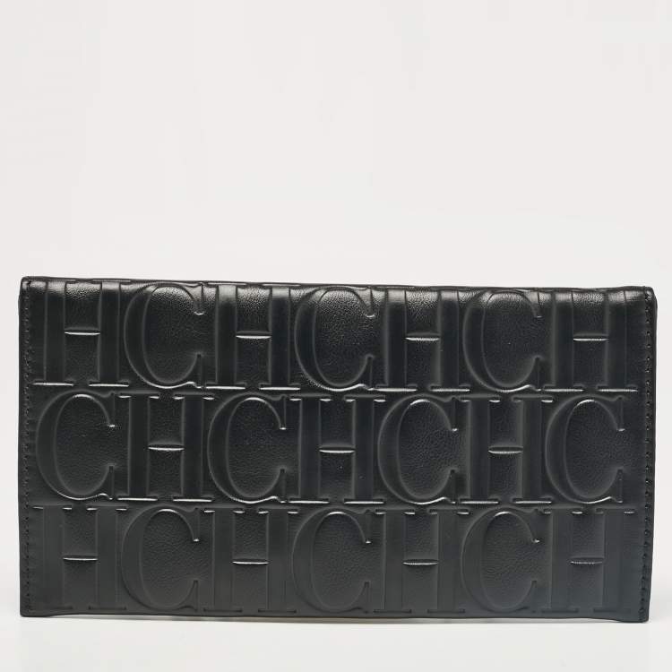 Pre Owned Carolina Herrera Black Monogram Embossed Leather Tassel Clutch