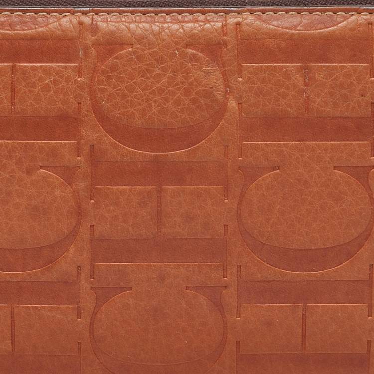 Pre Owned Carolina Herrera Brown Monogram Embossed Leather Zip Continental Wallet