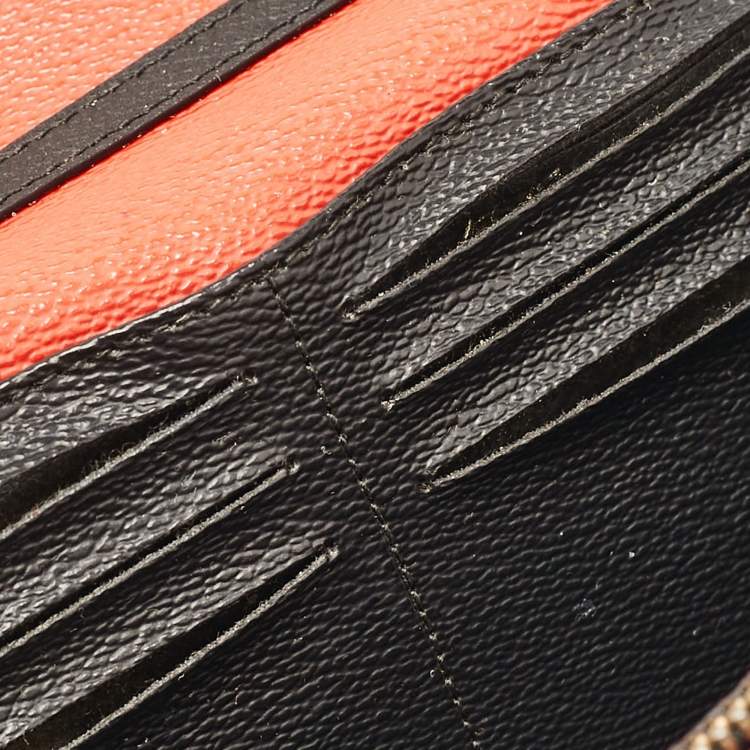 Pre Owned Carolina Herrera Black/Gold Monogram Coated Canvas and Leather Envelope Flap Clutch