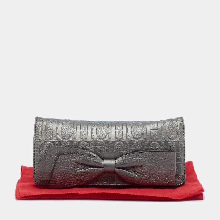 Pre Owned Carolina Herrera Metallic Monogram Embossed Leather Audrey Clutch